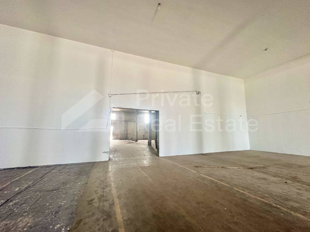 Open interior of industrial warehouse with tall ceilings Panama City