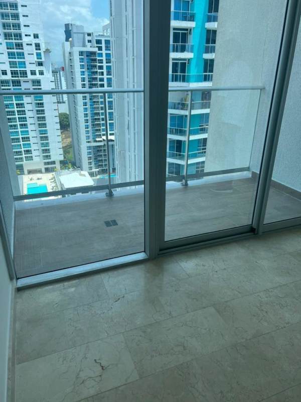 Light wood walk-in closet with drawers, built-in wardrobe, and panoramic window in Bella Vista