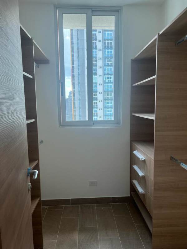 Bright living space with sliding glass doors to private balcony in PH Bella Vista Park Panama