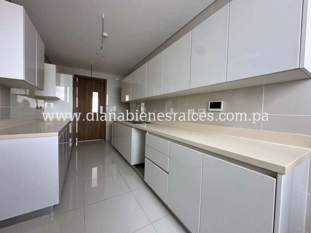 Spacious walk-in closet with shelving and drawers in luxury oceanfront condo Panama City