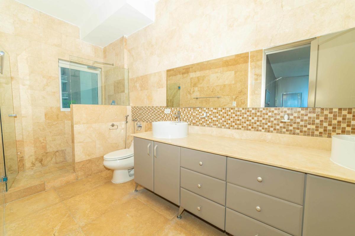 Contemporary kitchen with granite countertops and appliances at Q Tower Punta Pacifica