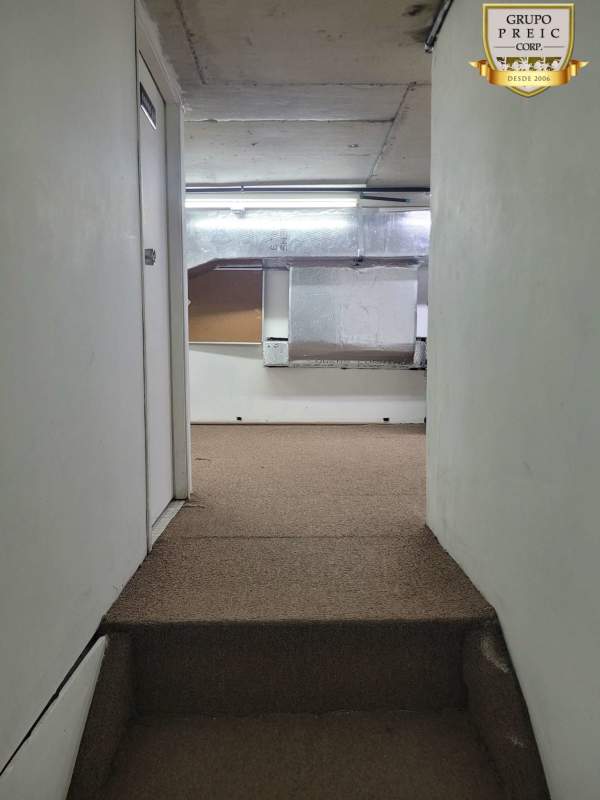 Retail unit with recessed lighting glass display cabinets inside Albrook Mall