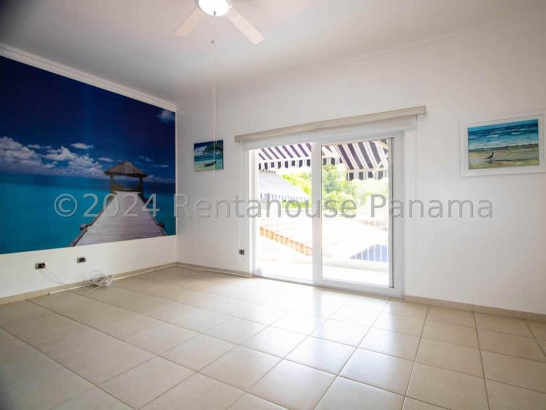 Dining space with floor-to-ceiling windows, high ceilings, contemporary decor clayton Panama home