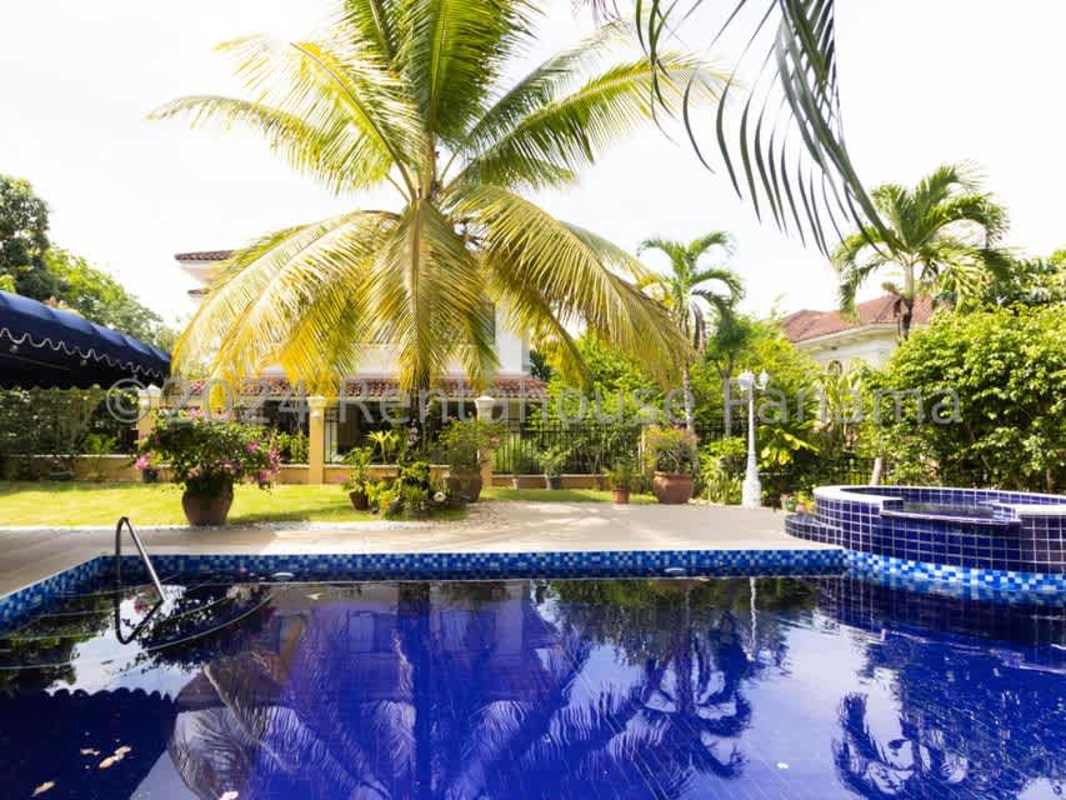 Spacious kitchen with granite countertops, wood cabinets, appliances clayton Panama