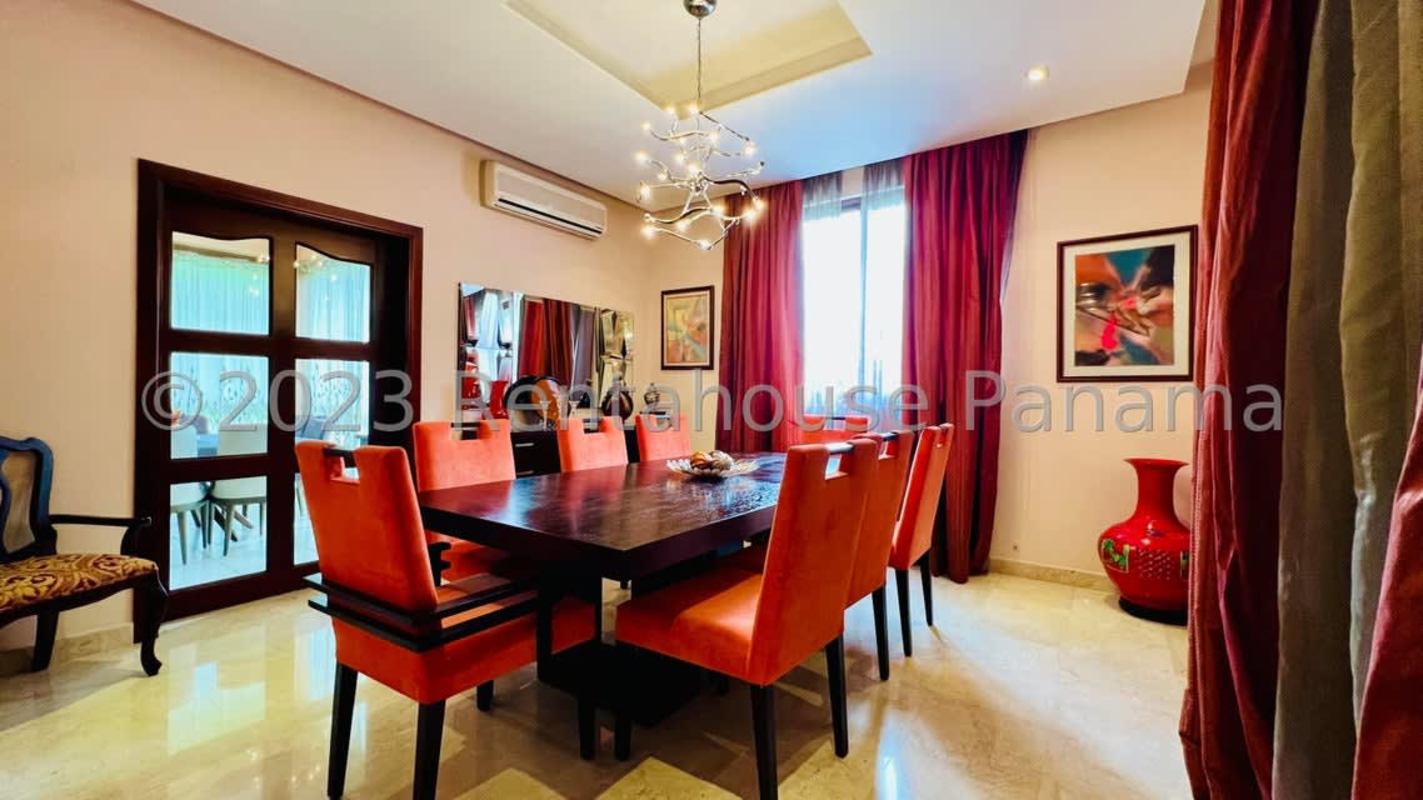 Formal dining room with large windows overlooking gardens colonial villa Camino de Cruces Clayton Panama