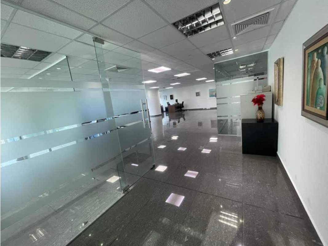 Modern reception lobby with partitioned offices at Oceania Business Plaza Panama City