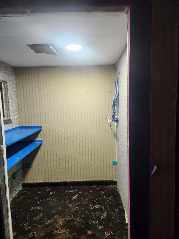 Large open floor space with glass entrance and counter inside Gran Estación mall Panama City