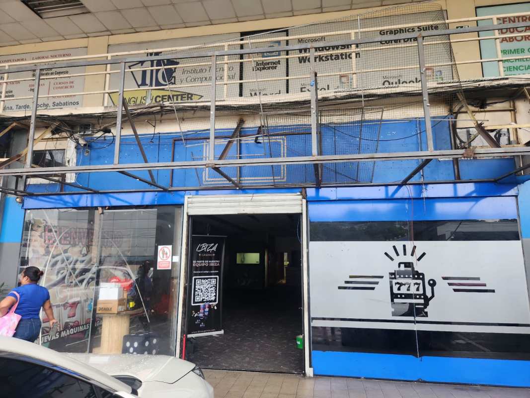 Glass doors storefront with signage frame at shopping center Panama City