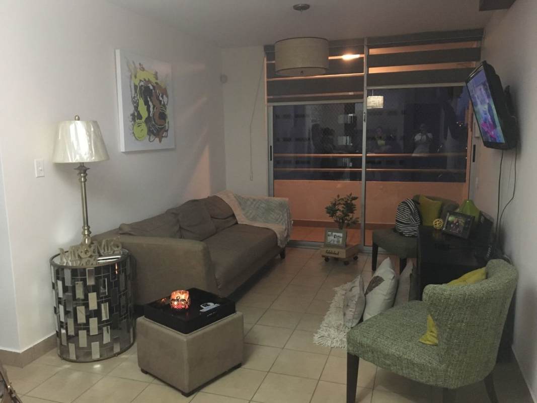 Contemporary living space with sliding doors to balcony PH Parque Lefevre Sky Panama City