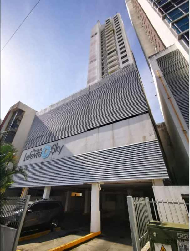 Modern high-rise exterior with striped design near Via Cincuentenario PH Parque Lefevre Sky Panama