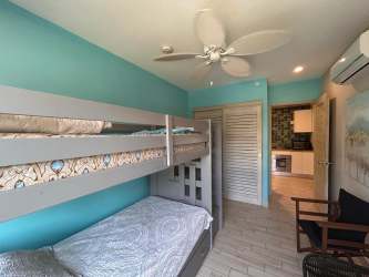 Modern kitchen with granite countertops in Playa Caracol Panama apartment