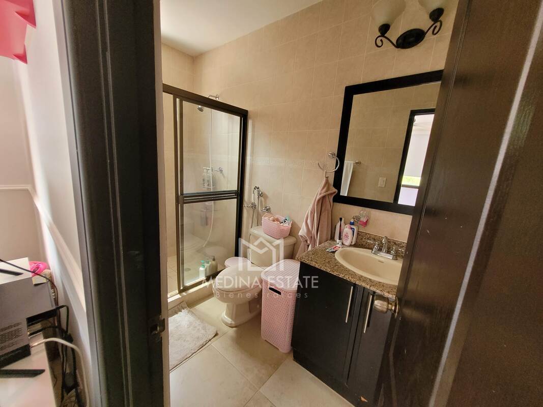 Bright bedroom with large windows, air conditioning, garden view in Clayton Village house Panama