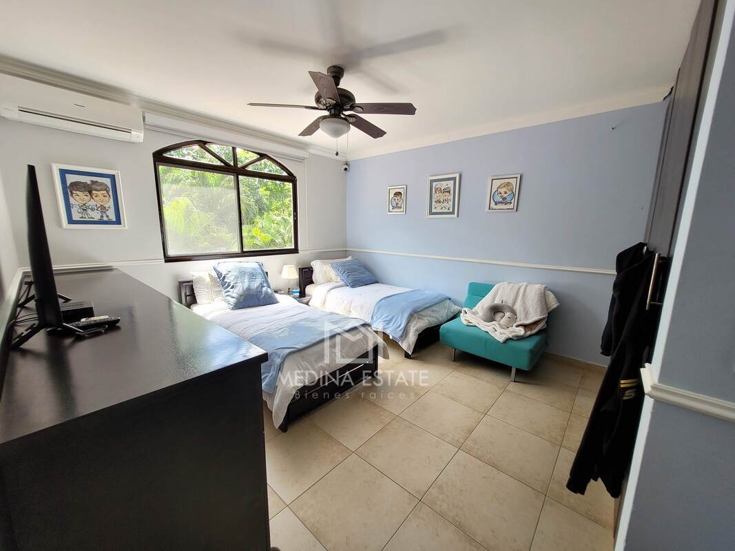 Spacious family kitchen with granite countertops, large refrigerator, dining area in house for rent Panama City