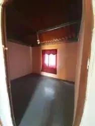 Traditional empty bedroom with wood ceiling and window in Urbanización Juan Pablo La Chorrera Panama