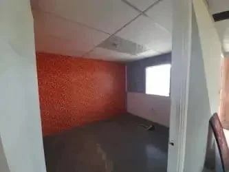 Small finished office or study interior with curtain and window at Urbanización Juan Pablo La Chorrera