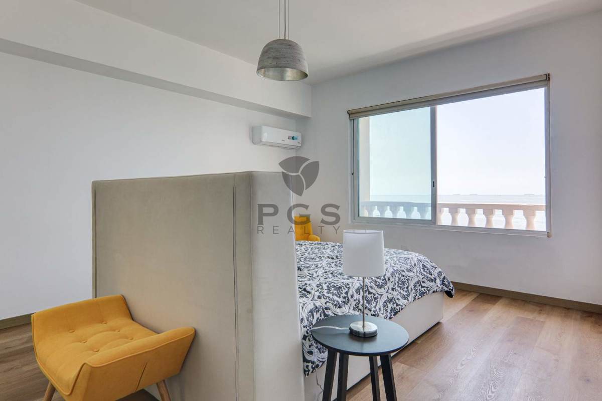 Contemporary bedroom floor to ceiling windows Pacific ocean view PH Vista del Mar Panama City