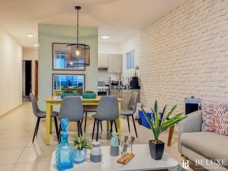 Open concept living and dining area beach apartment Coral Park Playa Blanca