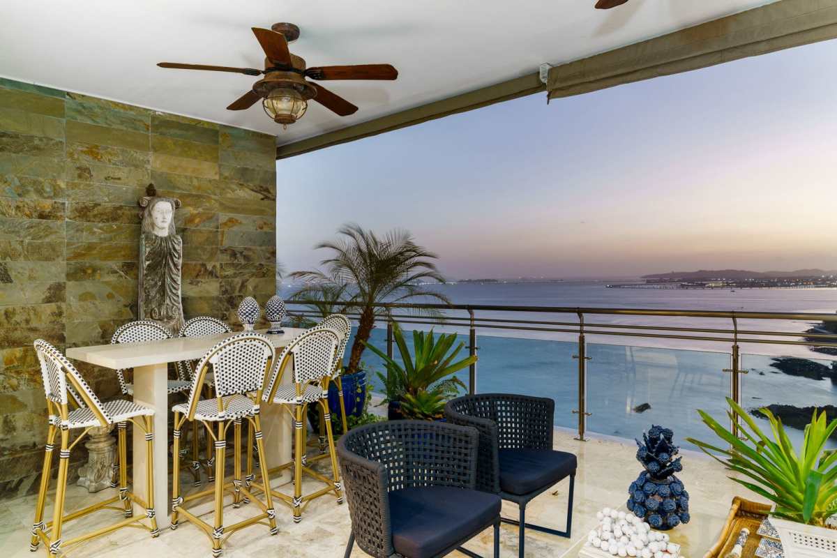 Spacious outdoor dining terrace with ocean views at PH Aqualina Punta Pacifica Panama