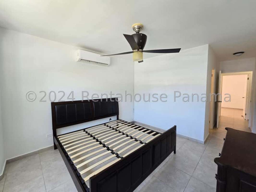 Kitchen with granite countertops, cabinets and natural light in PH Villa Lido Brisas del Golf