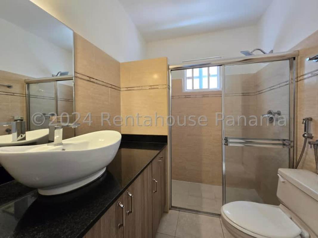 Bathroom with glass shower, ceramic sink and tile PH Villa Lido Panama