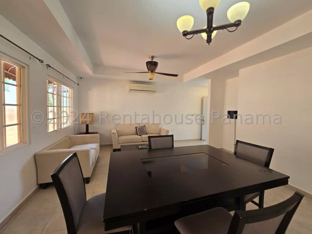 Bright living and dining room with tiled floors, ceiling fan and natural light Villa Lido Panama