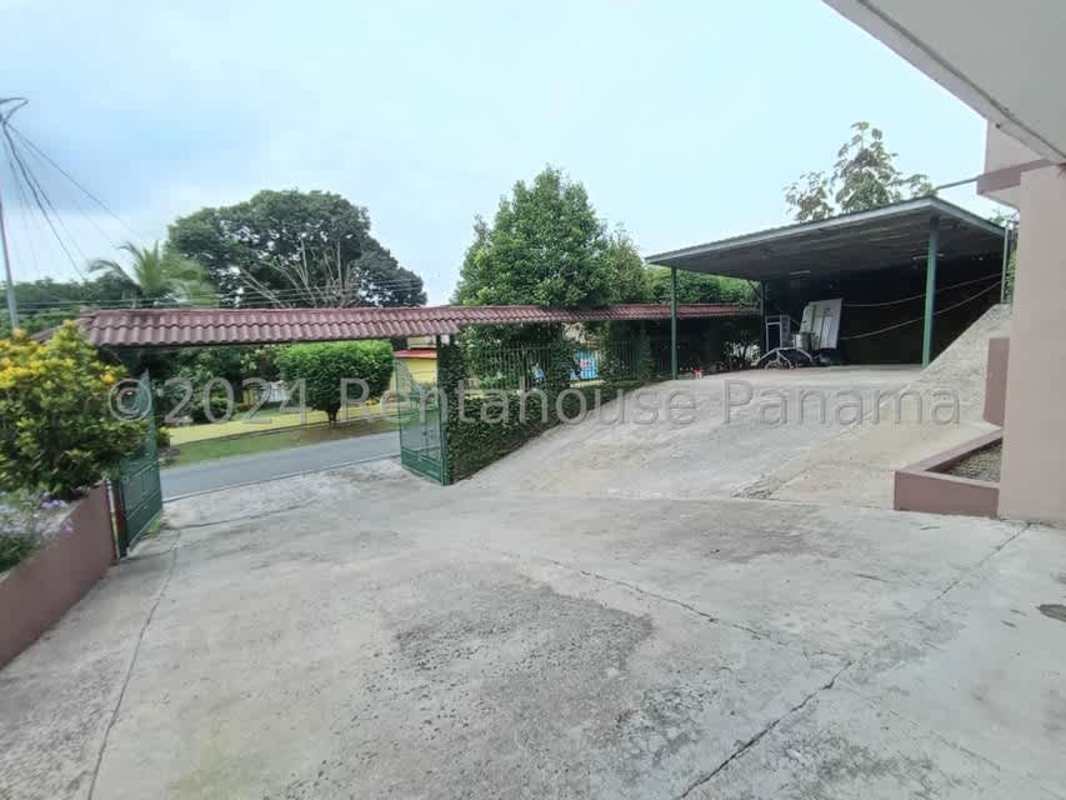 Classic wood cabinetry kitchen with appliances in Villa Zaita home Panama