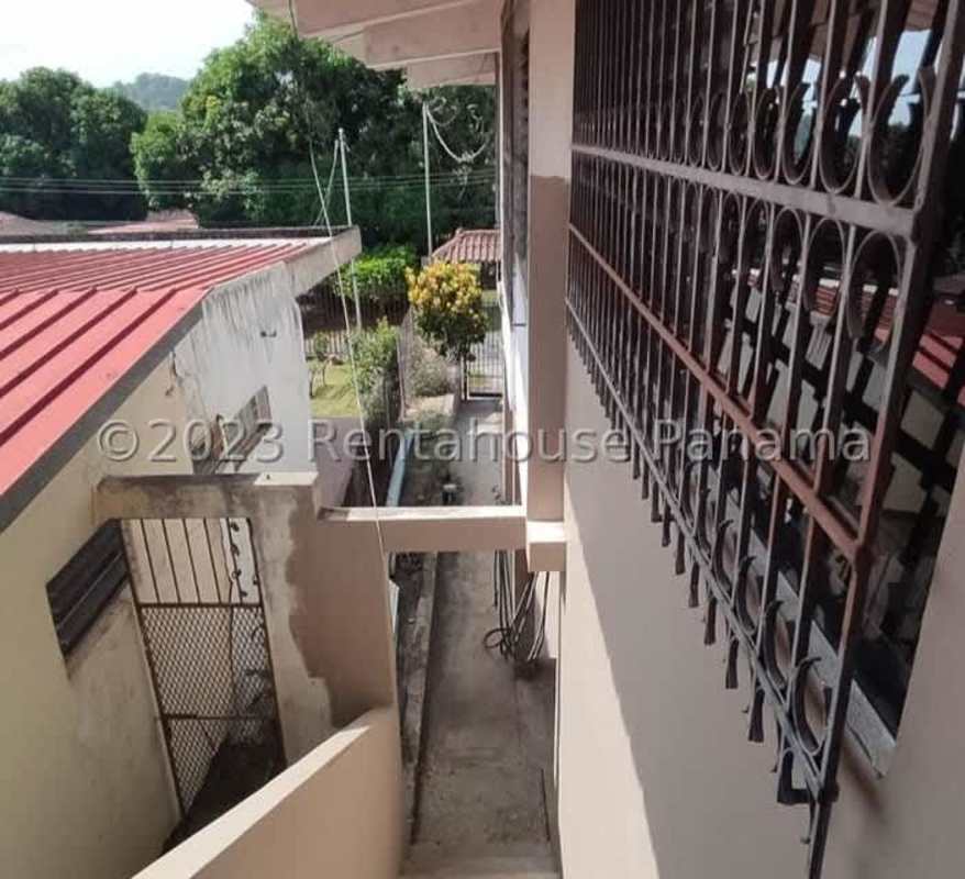 Exterior with metal gate and garden area in Villa Zaita residential neighborhood Panama