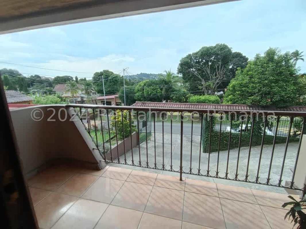 Balcony overlooking quiet residential street in Villa Zaita Panama