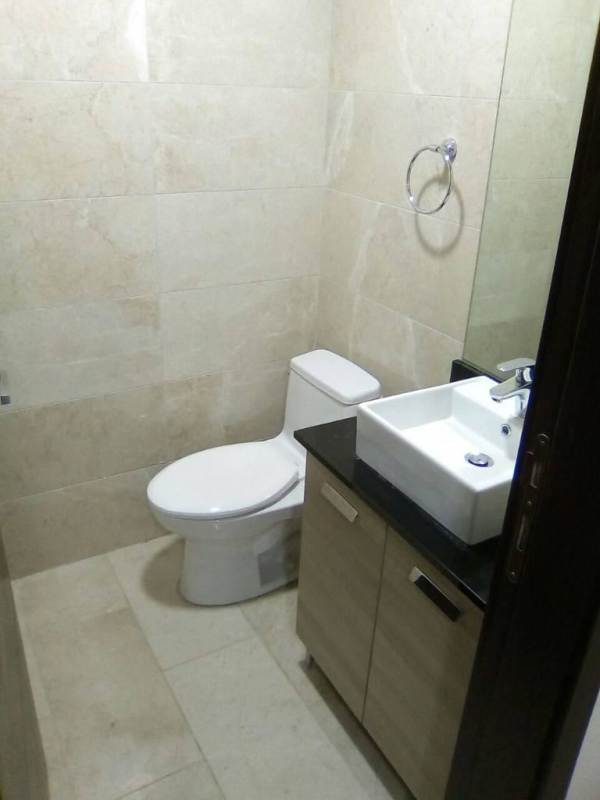 Large dining and living area with balcony ocean view PH Aqualina Panama