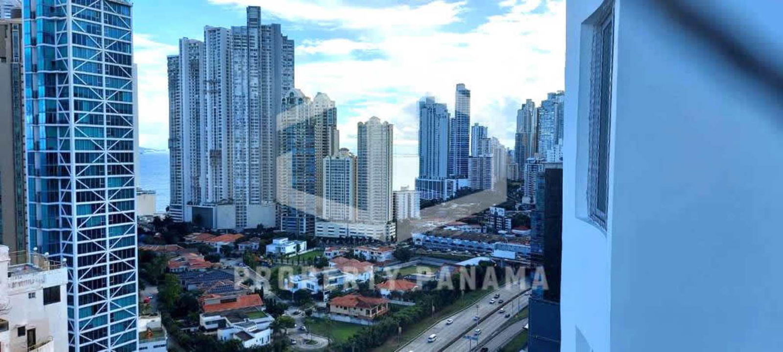 Gourmet kitchen with granite island wood cabinetry stainless appliances Punta Pacifica