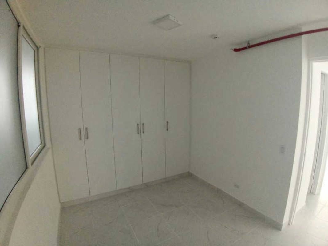 Minimalist white bedroom with built-in wardrobe PH Mystic Gates Llano Bonito Panama