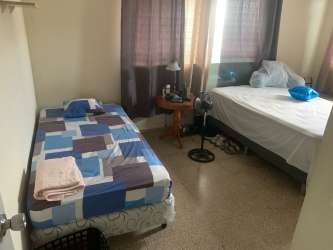 Bedroom with double and single beds, curtained windows Vista Alegre Arraiján Panama