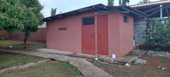 Exterior of detached deposit building in backyard with metal doors Vista Alegre Arraiján Panama