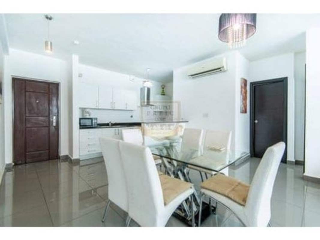 Master bedroom with split AC, ensuite bathroom, and city view at Quartier 74 Panama