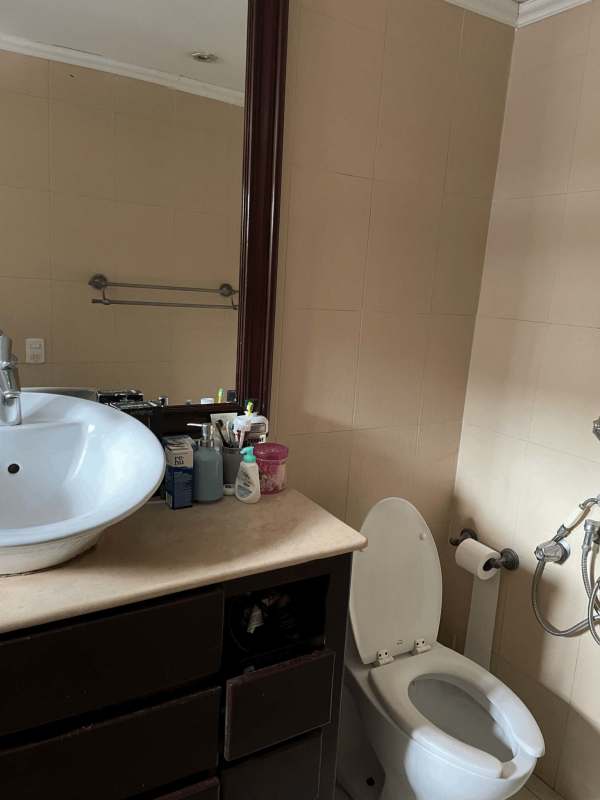 Grand foyer with double arched doors, tiled floors, staircase in Villas del Golf Brisas del Golf Panama