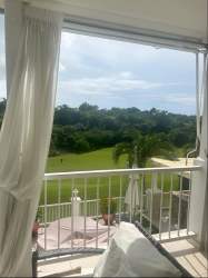 Bright bathroom vanity and shower in Bijao Rodman apartment Panama