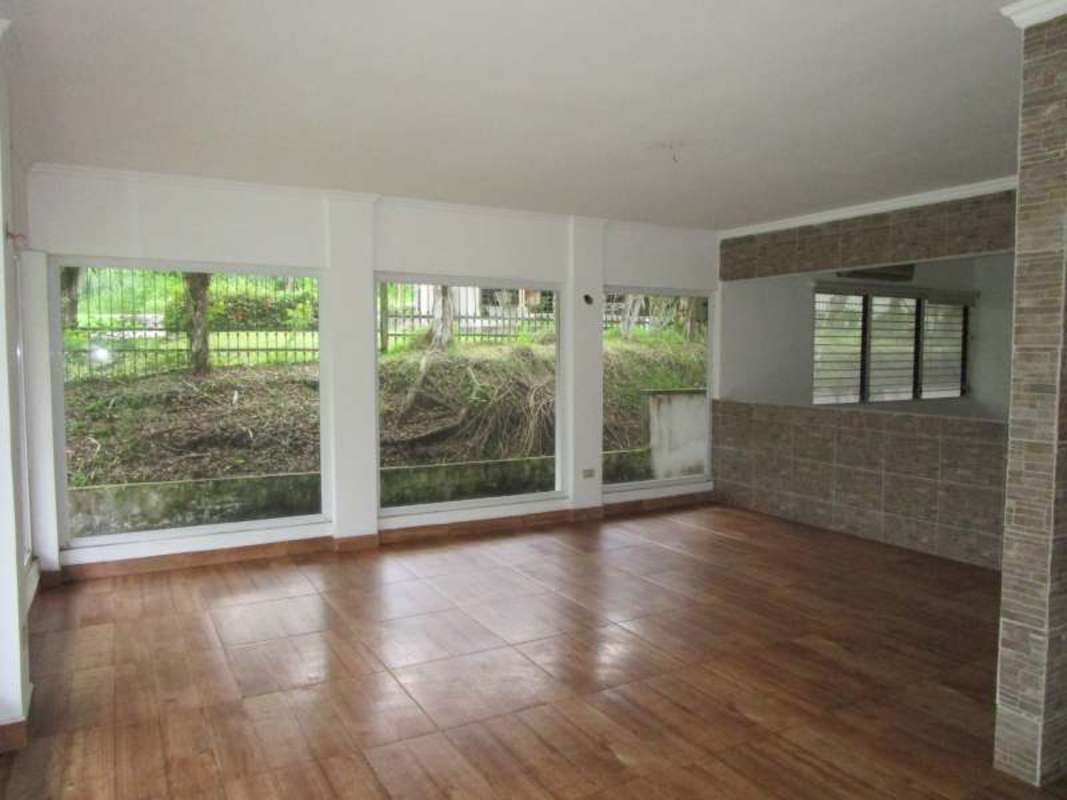 Luxury bathroom with jacuzzi jacuzzi tub and garden views in Las Cumbres Panama house