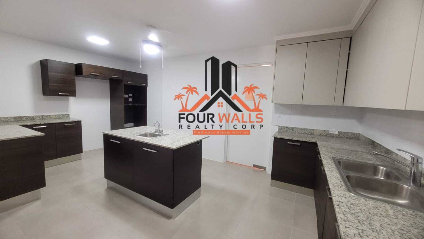 Open dining space with garden views and ample natural light in upscale Punta Paitilla house