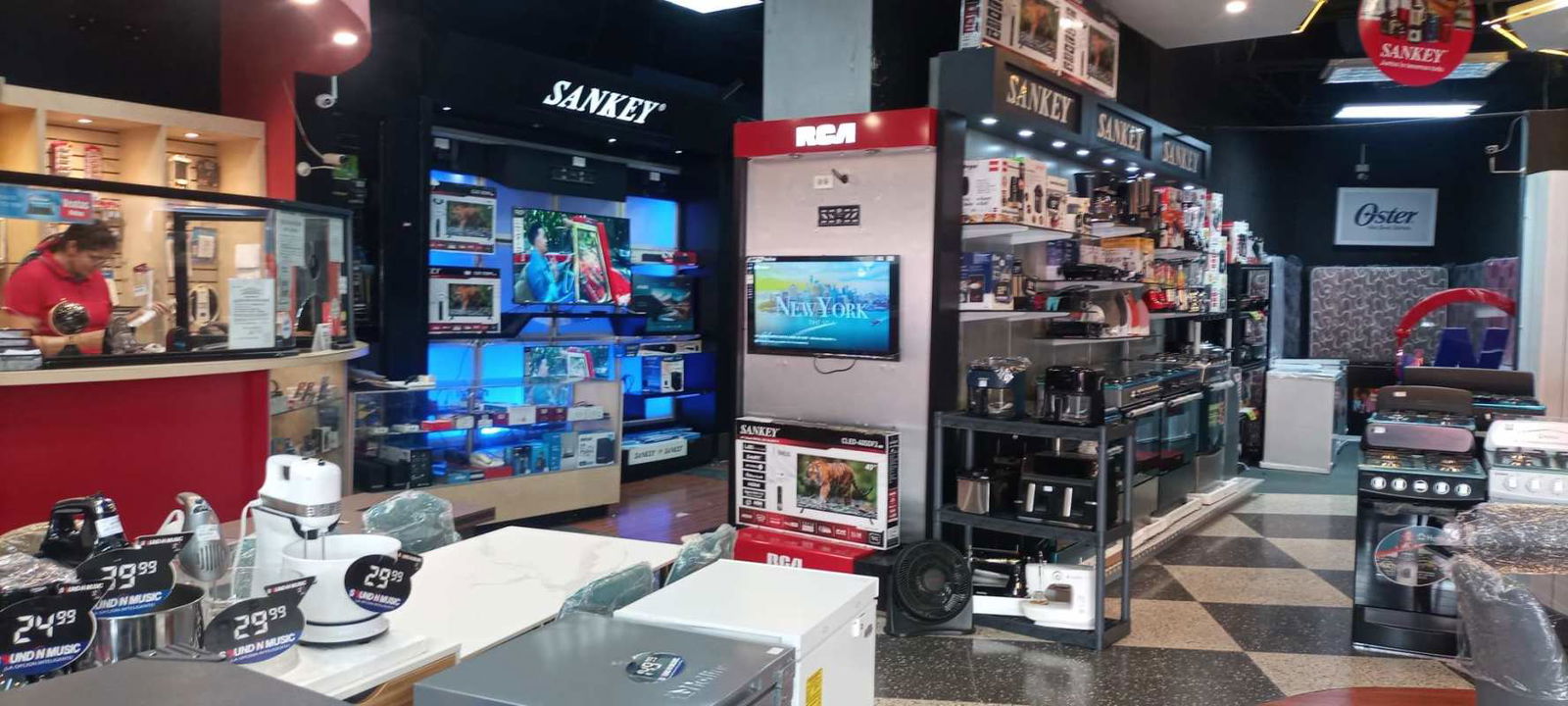 Electronics retail sales floor interior with displays in central Panama City commercial unit