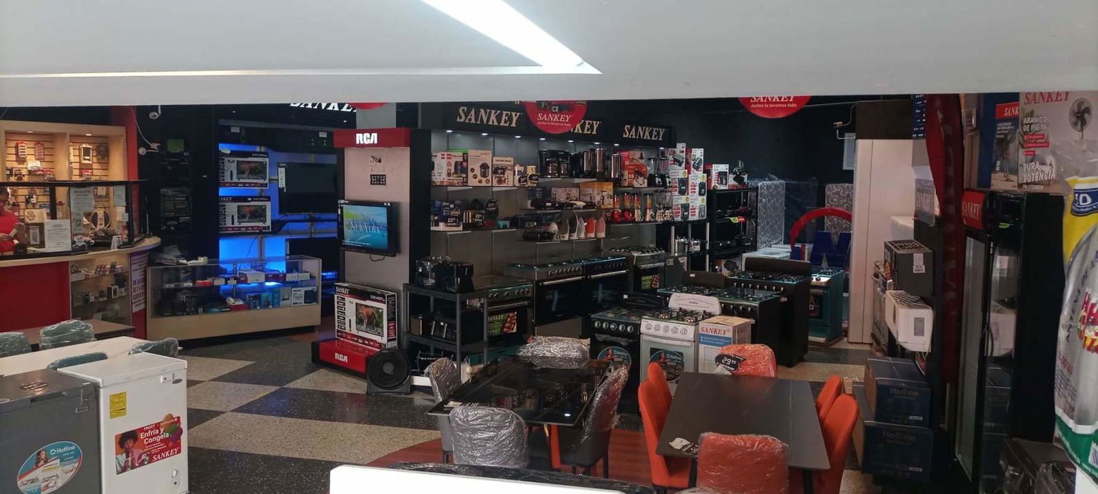 Interior sales floor showroom with display appliances located downtown Panama City
