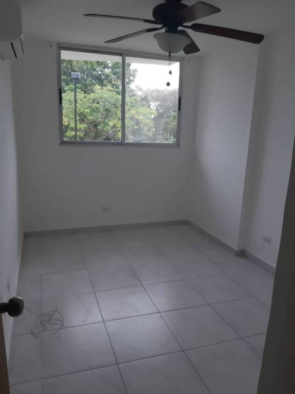 Bedroom with AC ready connection ceiling fan window tiled flooring PH Llano Bonito Panama City