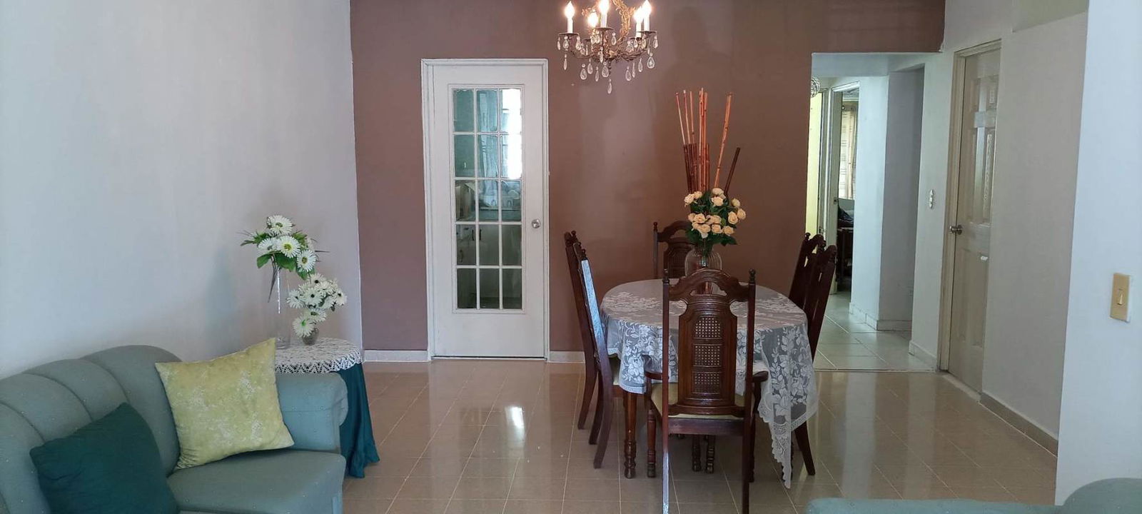 Large living dining room with bright windows in Las Glorietas Las Cumbres Panama