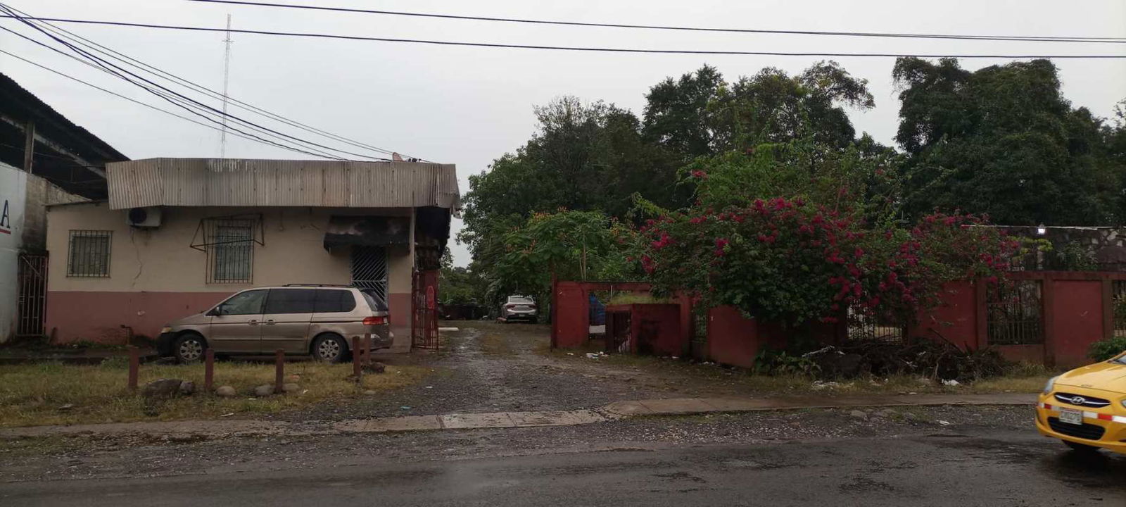 Gate entrance with house and rental units ideal for commercial residential combo in Pedregal Panama