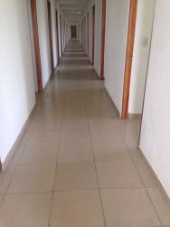 City street with border activity near commercial property Paso Canoas.