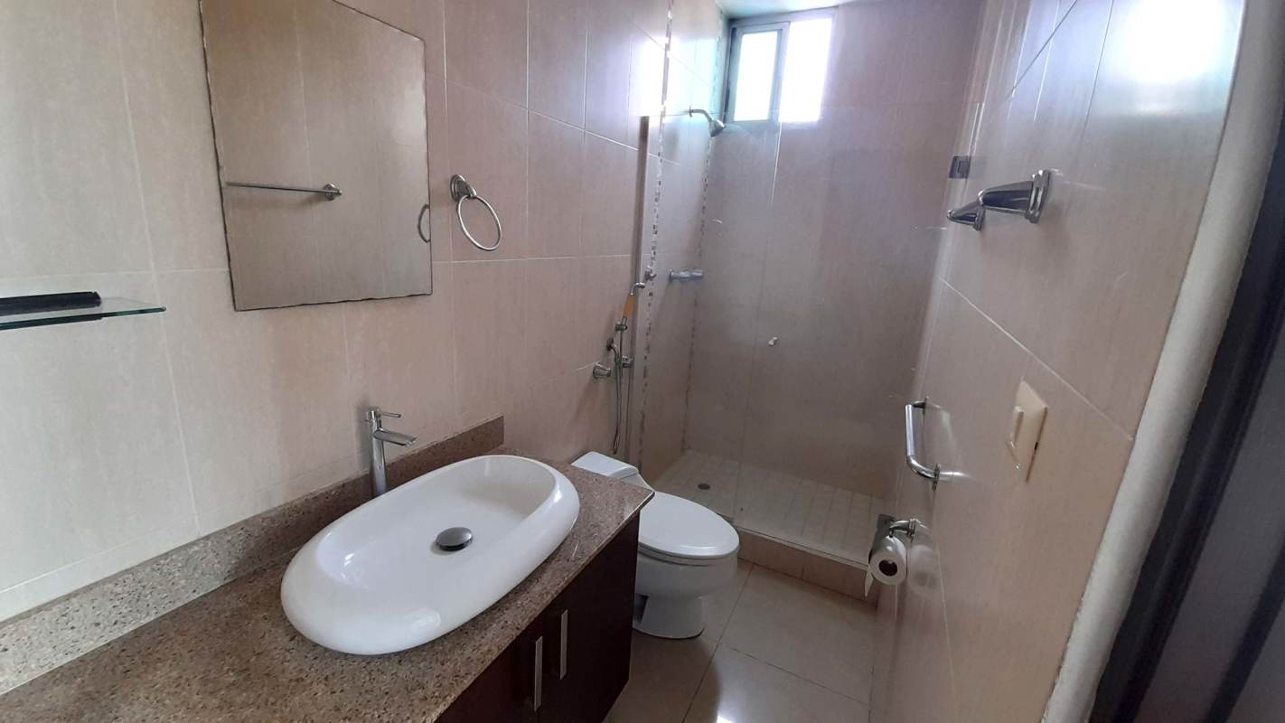 Modern bathroom with glass shower wall and vessel sink PH Pacific Sun Panama