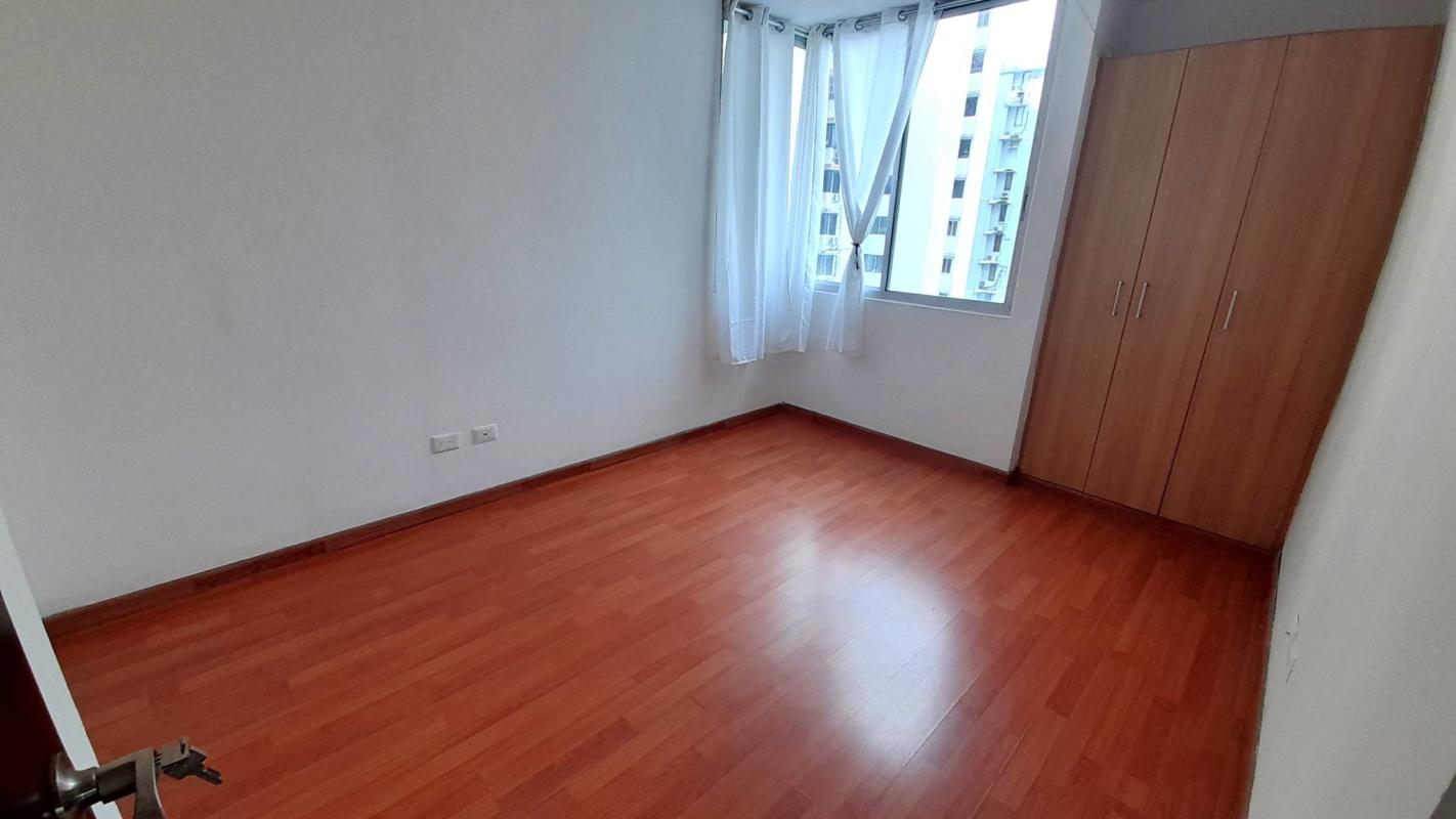 Bedroom featuring closet, AC, laminate wood flooring, Pacific Sun Punta Paitilla Panama