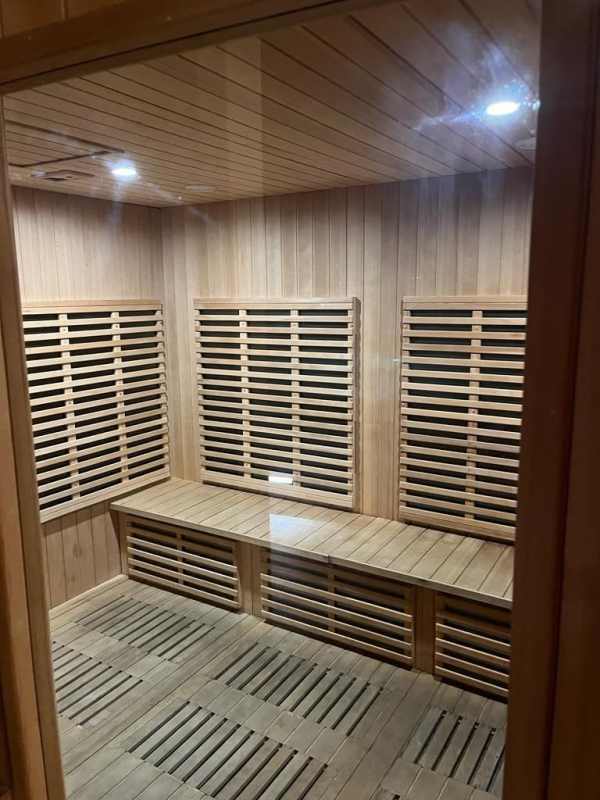 Modern private sauna with wood paneling at PH Coco del Mar Tower Panama