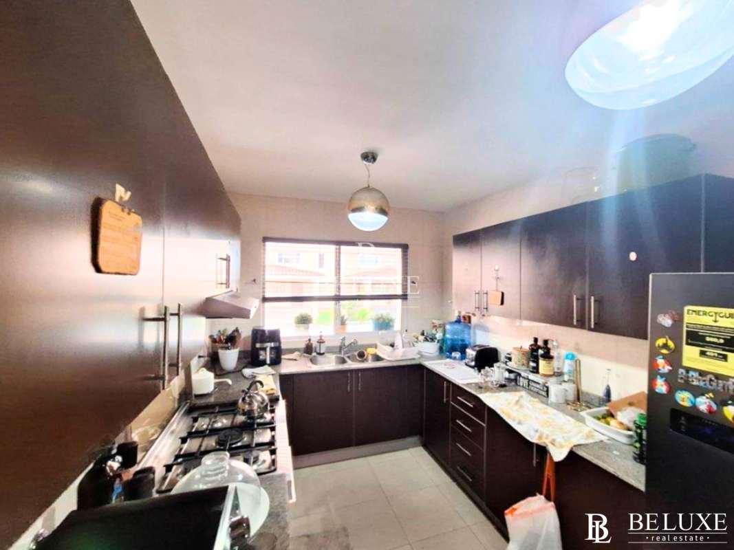 Kitchen with granite counters, cabinets and appliances PH Villa Tivoli Panama