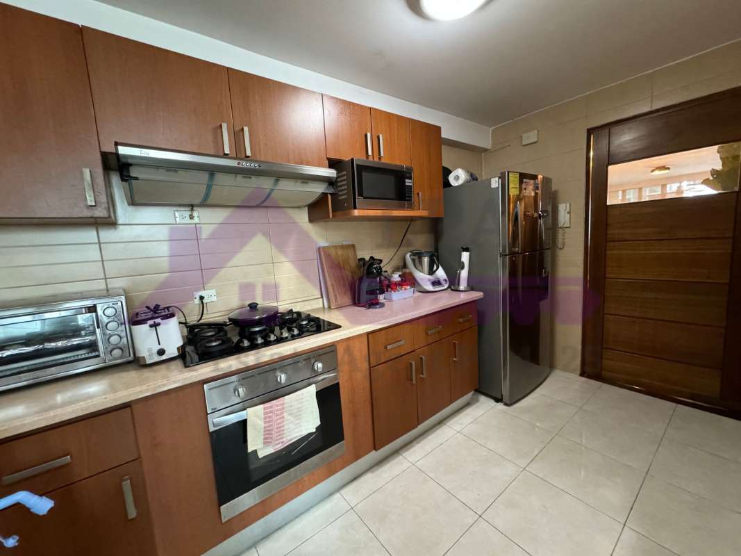 Modern tiled bathroom with glass shower enclosure PH Harmony Panama City