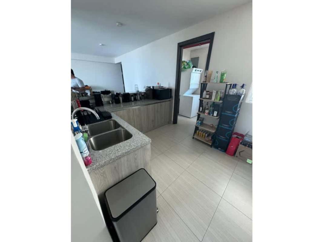 Modern dining space with floor-to-ceiling windows and skyline views Costa del Este Panama